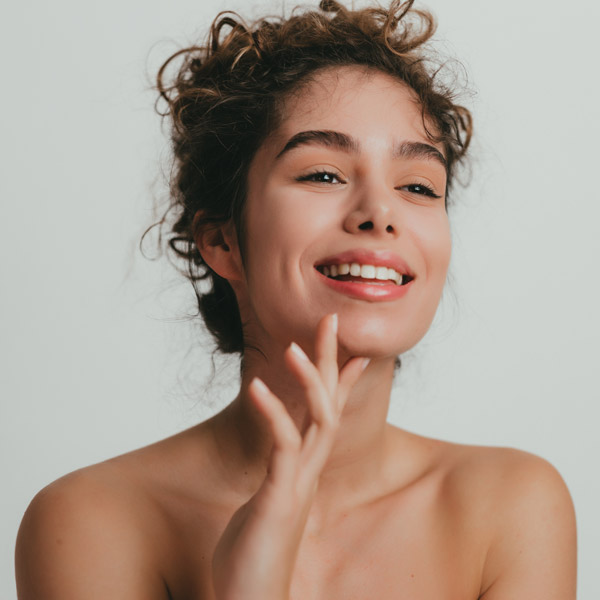 woman with perfect skin smiling